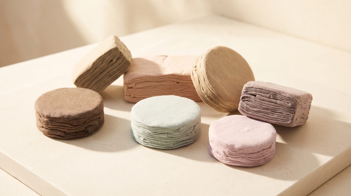 Compressed t-shirt pucks and shaped fabric discs made in house at 295 Guys